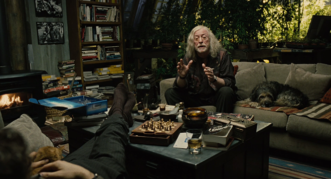 Screenshot from “Children of Men” showing Clive Owen and Michael Caine (dir. Alfonso Cuarón, 2006). Graphic: Universal Studios