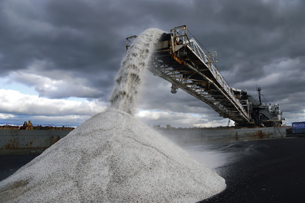 Rock salt being unloaded off of a ship in Oswego, New York, October, 2007 (James Rajotte / The New York Times / Redux)