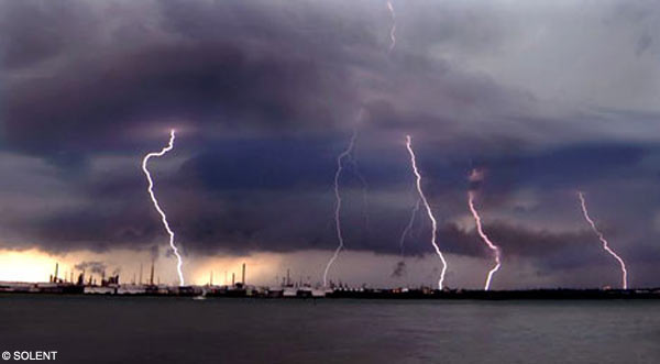 Lightning strikes dramatically over the Fawley Oil Refinery in Hampshire, 21 June 2007. Solent / dailymail.co.uk