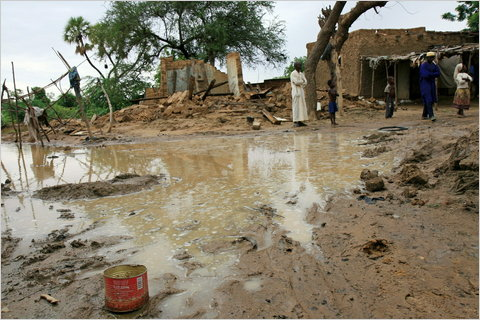 A photograph released by Oxfam of people near Zinder, Niger, where heavy rains and flooding are compounding food shortages caused by a prolonged drought. Agence France-Presse / Getty Images