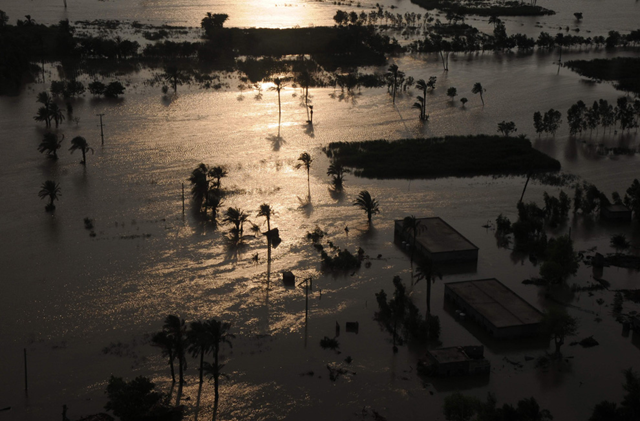 Pakistani city Mehmud Kot is submerged in floodwater near Multan, Pakistan on Sunday, Aug. 8, 2010. AP Photo / Khalid Tanveer