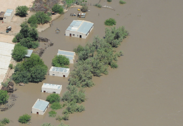 People in Upington, South Africa had to evacuate their neighbourhoods as rising floodwaters submerged their homes in January 2011. Emile Hendricks, Volksblad