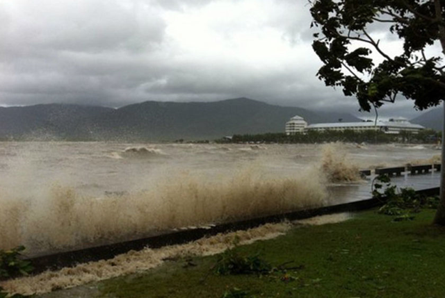 A massive storm surge caused by Cyclone Yasi batters the Cairns coastline on February 2, 2011. Cycloneupdate/www.twitpic.com / abc.net.au