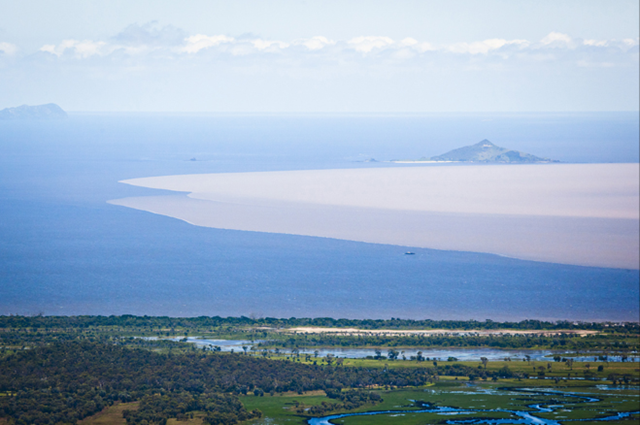 The swollen Fitzroy River pours damaging freshwater and pollutants onto the Great Barrier Reef near Rockingham during the worst of the Queensland flooding, December 2010. Rowan Bestmann / Wall Street Journal