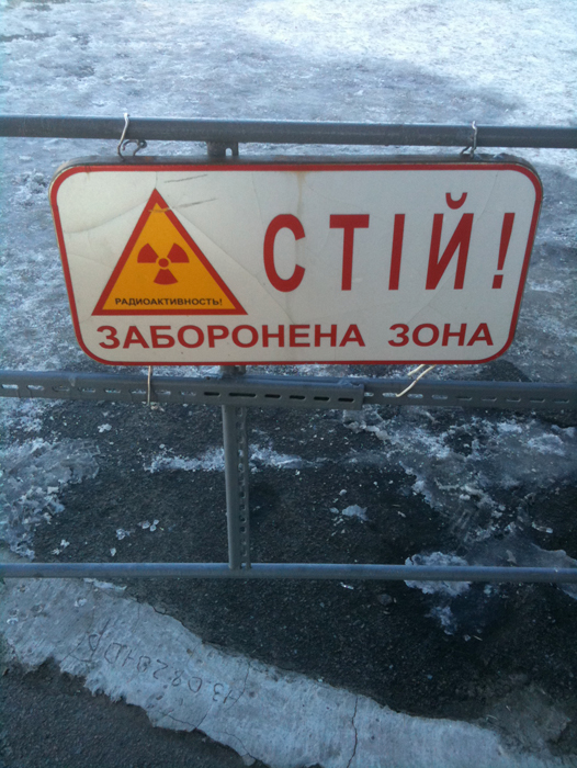 DANGER AHEAD: A warning sign at a checkpoint at the 30-kilometer exclusion zone around the Chernobyl nuclear power plant near Pripyat, Ukraine, 2011. Charles Q. Choi / scientificamerican.com