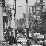Downtown Asuncion (Palma and Chile). Note the bullet holes on the wall and the old trolley car.<br />
El centro de Asunción (Palma y Chile).  Atención a los balazos en la pared, y al clásico tranvía.