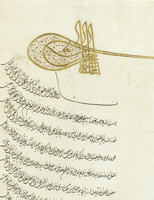This royal decree, or ferman, features 24 lines of divani script written in sefine ("boat") form, in black ink powdered with gold. It bears the seal, or tugra, of sultan Suleyman the Magnificent.