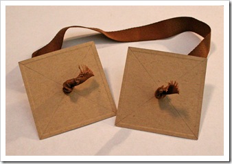 Ribbon through lid and base covers Ribbon through lid and base covers