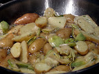 We made part of one of the menus from _Platter of Figs_. We would have made the whole thing, but I didn't have gluten-free lasagna noodles or chestnut flour. Still, OMG. We *will* be making the pan-fried artichokes and potatoes again. I'd cut the artichokes a little thicker next time and turn down the heat earlier so that they taste more like artichoke and are little less crispy.