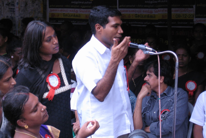 Father Jegath Cusper delivering a speech