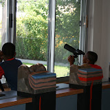 Kids from Nepperhan Community Center, who came to represent the Yonkers Green Team, enjoyed Beczak's telescopes.