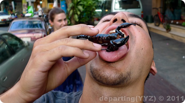 Scorpion Eating in Bangkok (Thailand)-1020942