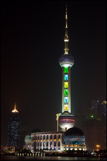 Time for the obligatory night-time shots! One of the oldest and most iconic features of the Pudong skyline is the Oriental Pearl TV tower. Built between 1991 and 1995, this 468 metre tower combines a hotel, three observation decks, exhibition and conference facilities, revolving restaurant and a shopping centre. Oh, it has TV and radio transmitters too...