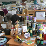Front display: Tilley winter hats, bird bath heaters, and Redpoll feeders
