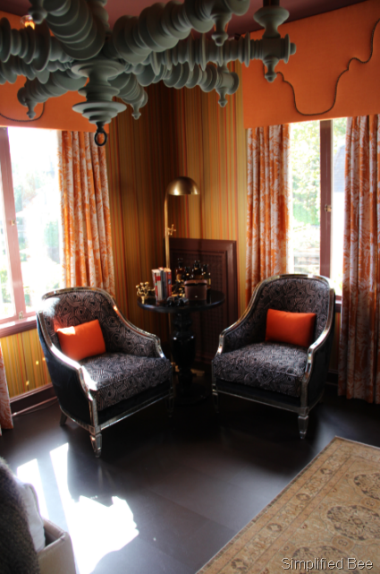 [orange wallpaper bedroom seating area[5].png]