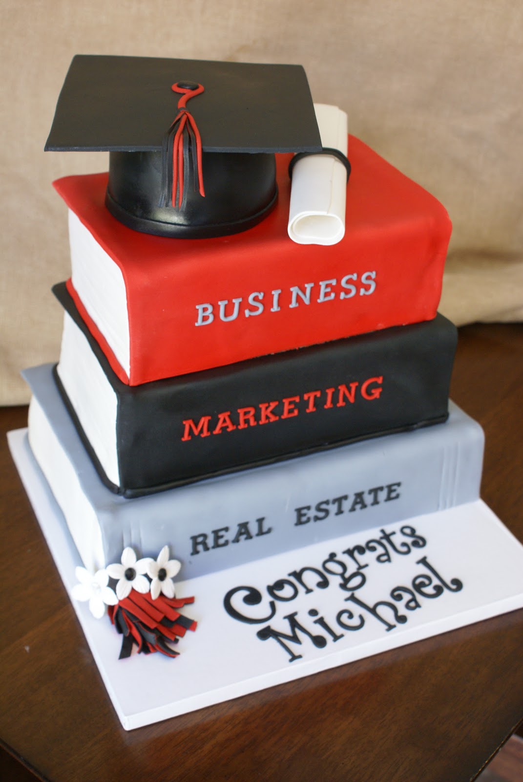 graduation stacked books cake