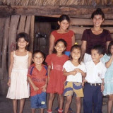 Reina, helper and several of the children in her pre-school class, 2004