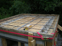 Hearth slab form ready to receive another batch of concrete.