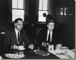 Seaborg and Kennedy enjoy some cookies.