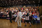 Attendees arrive for the Opening Ceremony/Plenary Session 1