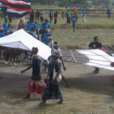 Another team prepares to launch their kite
