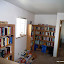 Our library/loft. We have too many books, so there is some overflow. Jacis office is through the door.