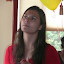 Devi checks the mike during setup