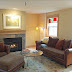 The living room features a gas fireplace.