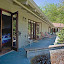 All three formal bedrooms open to the outdoor veranda and garden area.