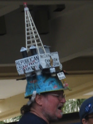 This Obama fan touted his McCain campaign platform oil rig helmet to everyone who would listen including the local news
