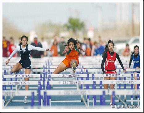 Harlingen South's Zariah Noyola, center, competes in the girls 100 meter hurdles at the Bobby Morrow Relays in San Benito Friday afternoon.  Zoyola placed first in the race. (Dina Arévalo/Valley Morning Star)