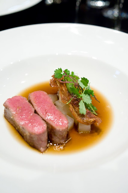 Roast Loin of Gippsland Lamb, Crisp Lamb Belly, Braised Daikon, Jerusalem Artichoke, Mushroom Infusion Roast Loin of Gippsland Lamb, Crisp Lamb Belly, Braised Daikon, Jerusalem Artichoke, Mushroom Infusion