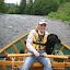 River tours and guided fishing are available at the lodge. Here our daughter-in-law is on the river with her dog Codie.