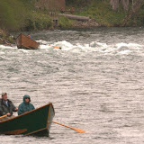 Some boats floating in the 2009 Wooden Boat Parade on the McKenie River