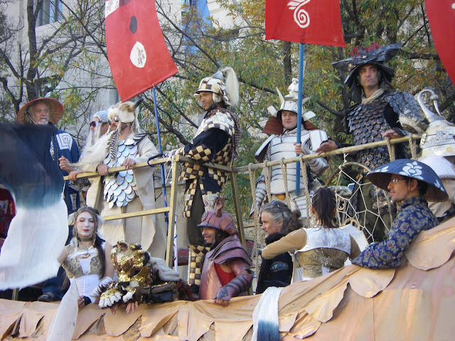 Fear-inspiring characters ride the golden dragon.