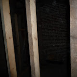 Green Show House j - Jan 19 2009 shoes, framing, recycled brick wall