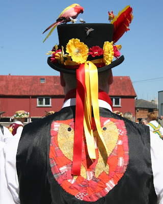 Back of waistcoat and hat