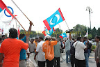 Crowd dispersing - note the orange Makkal Sakthi Crowd dispersing - note the orange Makkal Sakthi