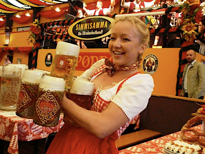 The waitresses can carry lots of beers!