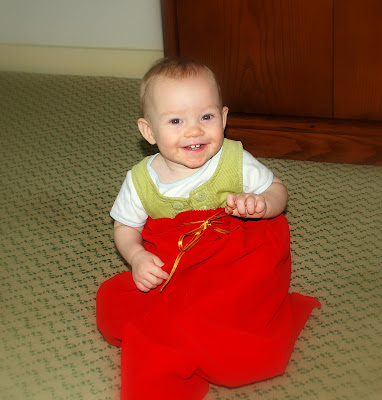 Claire playing with Santa's sack