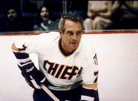 Reg Dunlop Those baby blues...sigh... straight from the lips of Lady Bee! Slap Shot is a classic, and we could not leave the late, great Paul Newman off our list!