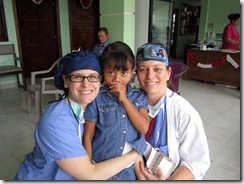 An appreciative patient with her doctor and nurse