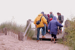 platform bovenaan trap met uitzicht op strand van Blankenberge (W.) en haven van Zeebrugge (O.)