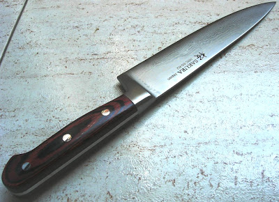 See how the blade extends all the way through the Pakka Wood Handle.