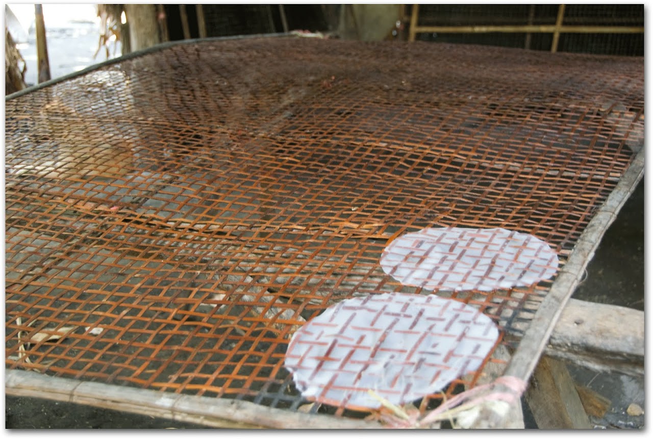 Rice paper roll drying on bamboo rack