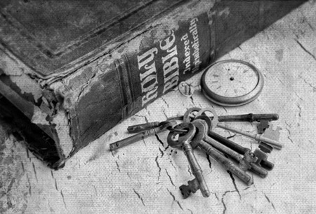 Bible Watch and Keys on a Grunge Background