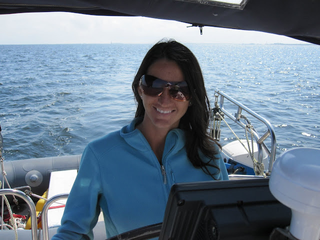 Carol at helm.