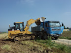 CAT 973C et Volvo FM 12