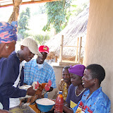  &ndash; Chickens are given to Pa Foday and James as a gesture of thanks for the supplies brought to them. .....Dec. 2, 2007…. © 2007 NHA Photos