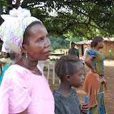  &ndash; James greets a blind woman and children as he makes his way to Kamasorie Village to deliver supplies and Medicines. Dec. 2, 2007…. © 2007 NHA Photos